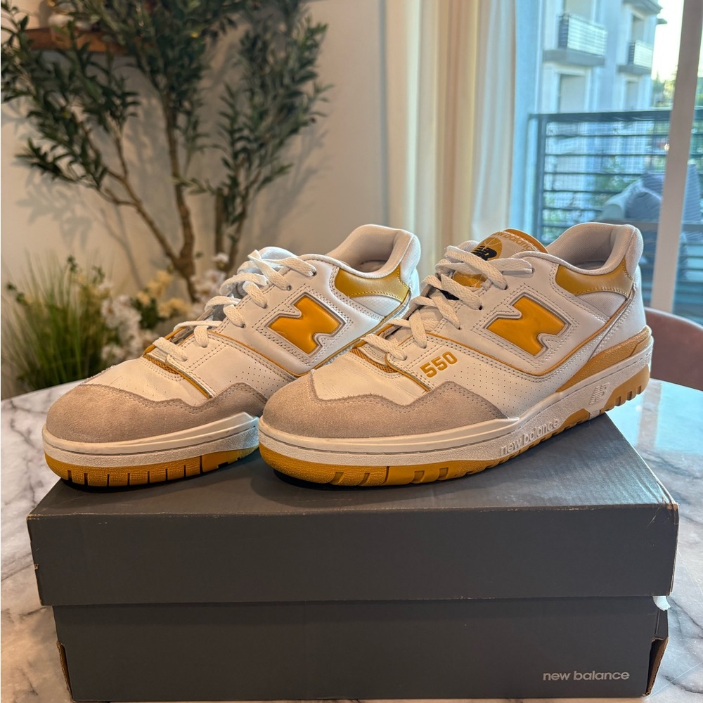 New Balance 550 Sneakers in White and Gold